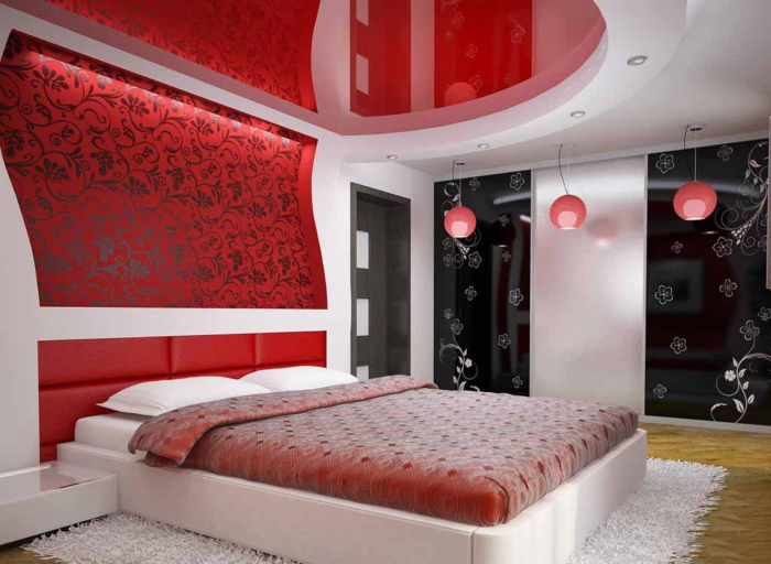 Красные глянцевые натяжные потолки в спальне